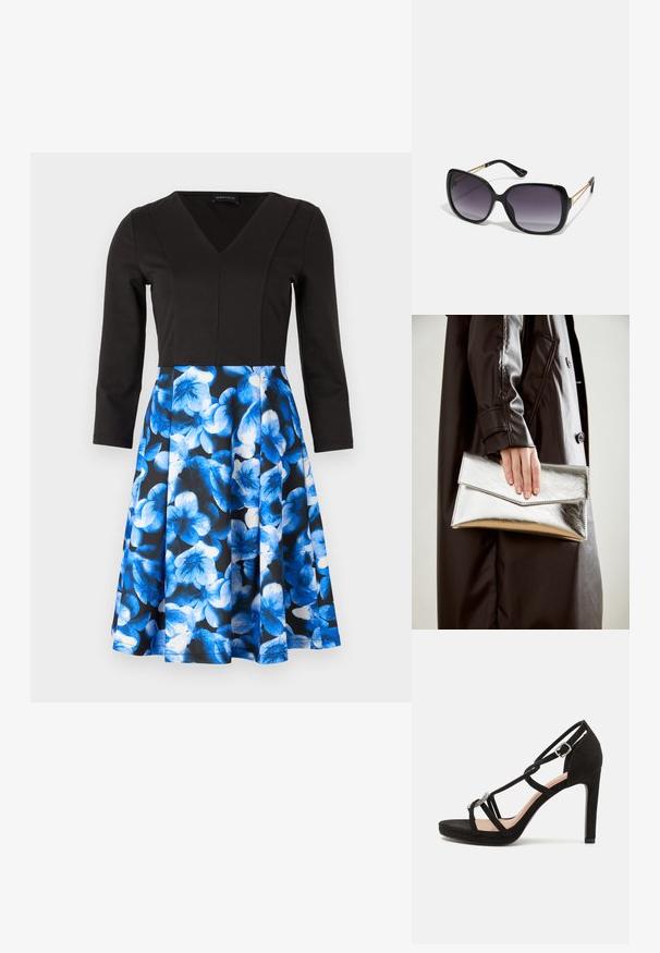 Vestido preto com mangas longas e decote em V. A saia apresenta um padrão floral azul sobre um fundo escuro. Feito de um tecido suave, com corpete ajustado.; Sandal de salto alto em camurça preta com tiras entrelaçadas, um detalhe decorativo em tom prateado e uma sola plataforma para maior altura.; Óculos de sol oversized pretos com lentes degradê, armações grossas e detalhes em corrente dourada nas hastes.; Clutch metálica prateada com um design de envelope angular, textura suave e cor interior contrastante, segurada numa mão que veste um casaco preto.