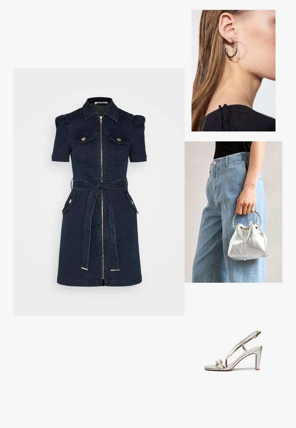 Marineblå denimkjole med korte puffærmer, lynlås foran, to brystlommer, taljebælte og guldfarvede knapdetaljer.; Metallic sølv højhælet sandal med åben tå, der har tre tynde stropper over foden og en ankelstrop med spænde.; Metallic sølv bucket bag med en tekstureret overflade, prydet med et sølv rundt håndtag og snørelukning, holdt mod lyseblå jeans.; Sølv hoop ørestik med en poleret overflade, prydet med små guld accenter og en rund form, båret på øreflippen.