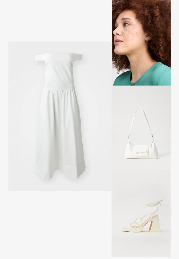 Biała sukienka bez ramiączek z dopasowanym gorsetem i elastyczną talią, z płynącą, marszczoną spódnicą i gładką teksturą.; Biała sandał na wysokim obcasie z masywnym słupkiem, z paskowym wzorem i wiązaniem przy kostce. Gładka faktura z platformą z przodu dla dodatkowej wysokości.; Biała syntetyczna torba o trójkątnym kształcie, płaskim przednim klapce i detalach w postaci kokardy, regulowanym pasku, gładkiej fakturze oraz minimalistycznym designie.; Srebrna kolczyk w kształcie okręgu z teksturowaną krawędzią, noszona przez osobę z kręconymi rudymi włosami, ubraną w zielony top.