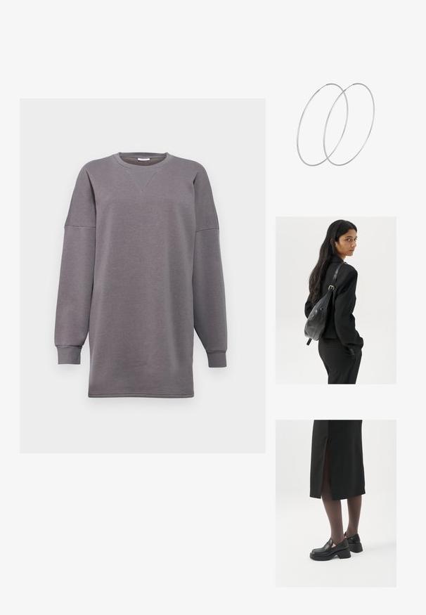 Sivina, prevelika pulover s dolgimi rokavi, okroglim izrezom in subtilno šivano podrobnostjo spredaj. Narejen iz mehkega, teksturiranega materiala.; Črne usnjene čevlje s zaobljenim prstom, debelim blokastim petama in elastičnimi stranskimi detajli, v kombinaciji s temno nogavicami in črno krilo z razporkom.; Ženska z dolgimi temnimi lasmi, oblečena v črn kostim, nosi črno usnjeno torbo čez ramo in se ozira čez ramo proti beli podlagi.; Srebrne uhane v obliki obroča z minimalističnim dizajnom. Krožna oblika, gladka tekstura in tanek profil. Lahki s poliranim zaključkom.