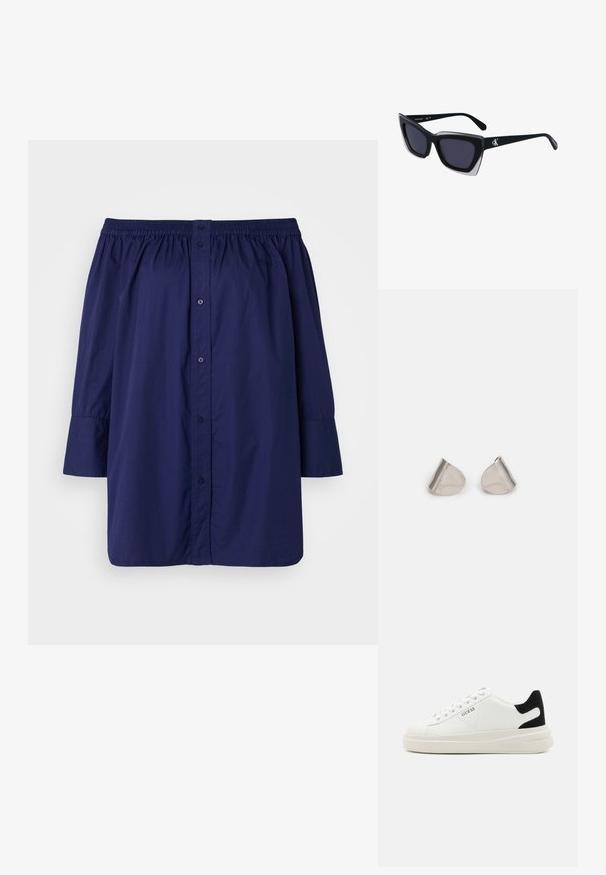 Sötétkék, egyvállas blúz könnyű anyagból. Gombos záródással, rugalmas nyakkivágással és hosszú, enyhén puffadt ujjal rendelkezik.; Fehér bőr sportcipők vastag fehér talppal, fekete velúr sarokpikkelyel és dombornyomott logóval az oldalon. Fűzős kialakítás, hat fűzőlyukkal.; Fekete, nagyméretű napszemüveg geometrikus formával, sötét lencsékkel és kontrasztos szürke részlettel a kereten. Logó a szárán.; Ezüst fém fülbevalók sima, csepp alakú formával és fényes felülettel. Finom gravírozások teszik részletessé. Minimalista dizájn.