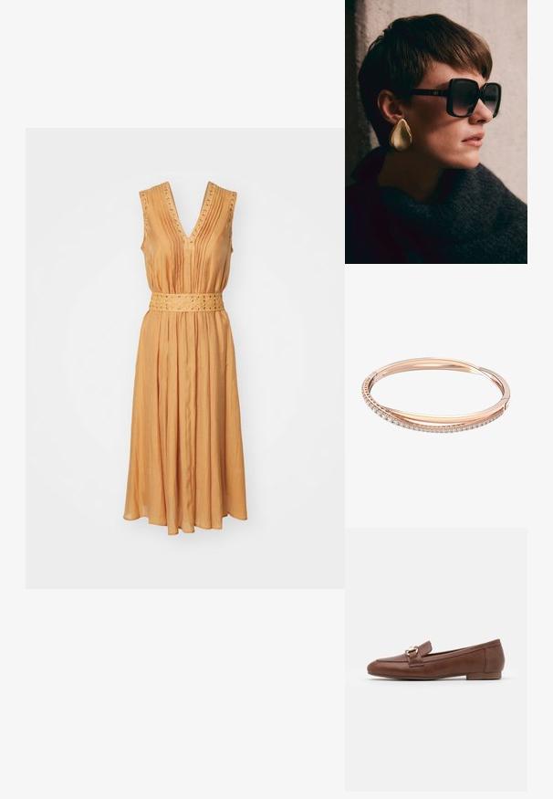 Käeauguta, V-kaelusega kleit sooja apelsinitooni, millel on voldid ja vöö väikeste nupukestega. Sile, kerge materjal.; Pruunid nahast loafers, millel on lame tald, õmmeldud disain ja kuldne pandla detail vampi üleval.; Mustad ülemized prillid tumedate läätsede ja kuldse seadistusega, koos suurte läikivate kuldsed tilgakujuliste kõrvarõngastega. Tume tekstuuriga sall.; Roosa kuldne käevõru, millel on kaks omavahel seotud riba, millest üks on kaunistatud rida teemante, sile pind ja siledad servad.