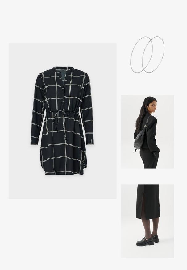 Must musträpp mustra, millel on valge ruudustik, pikad varrukad, nööbitav eesmine osa ja vöödiga vöö, mis tagab reguleeritava sobivuse. Sile kangas.; Mustad mustad jalatsid ümmarguse varbaga, paksu plokkniidi ja elastsete külgdetailidega, kombineeritud tumedate sukkade ja musta lõhikuga seelikuga.; Pikkade tumehaired naine mustas ülikonnas, kandes musta nahast õlakotti, vaatab üle õla valge tausta taustal.; Hõbedased rõngastikkaehingad minimalistlikus disainis. Ümar kuju, sile tekstuur ja õhuke profiil. Kerged ning poleeritud viimistlusega.