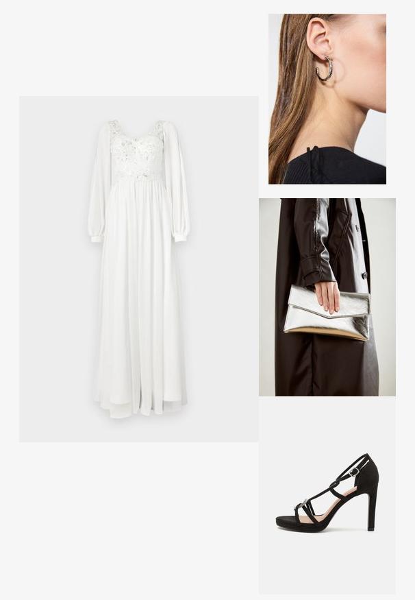 Lång vit klänning med en spetsöverdel med broderi, uppvikta långa ärmar och en flödande kjol. Slät textur och lätt material.; Svart mocka högklackad sandal med korsade remmar, en dekorativ silverfärgad accent och en plattformssula för extra höjd.; Silverfärgad metallisk kuvertväska med en vinkelrät design, slät textur och kontrasterande innervärd, hålls i en hand som bär en svart kappa.; Silverörhänge med polerad yta, med små detaljer i guld och rund form, bärs på loben.