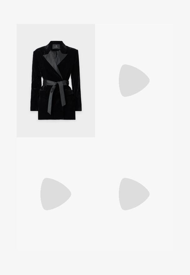 Black velvet blazer with satin shawl collar, long sleeves, front pockets, and a tied belt at the waist. Smooth texture and tailored design.; White short-sleeve T-shirt made of soft cotton. Features a round neckline and relaxed fit. Clean design with no visible patterns or accents.; Black wide-leg trousers with high waist, button details on waistband, and front pleats.; White high-heeled shoe with a pointed toe, block heel, and ankle strap. Smooth finish with a subtle shine and beige inner lining.