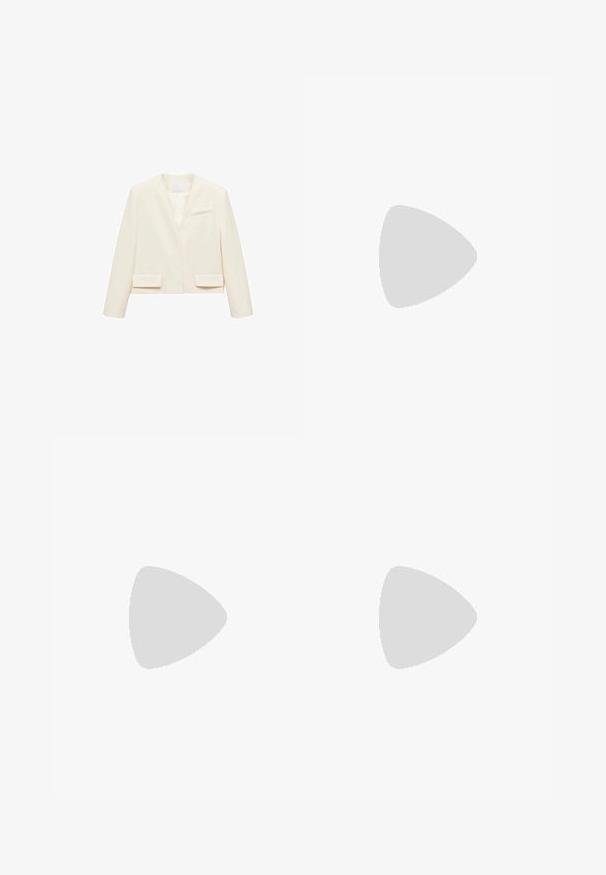 Krämfärgad kort blazer med V-ringning, långa ärmar, två framfickor och en enda bröstficka för en minimalistisk design.; Vit skräddarsydd topp i ribbat tyg med korta ärmar och rynkade detaljer på sidorna för textur och form.; Vita vida byxor i vid passform gjorda av ett lättviktsmaterial. Har en elastisk midja med dragsko och sidofickor. Slät textur.; Ljusrosa mockaskor med vita ränder och snören, med en strukturerad tunga och en gummisula, placerade på en blå matta.