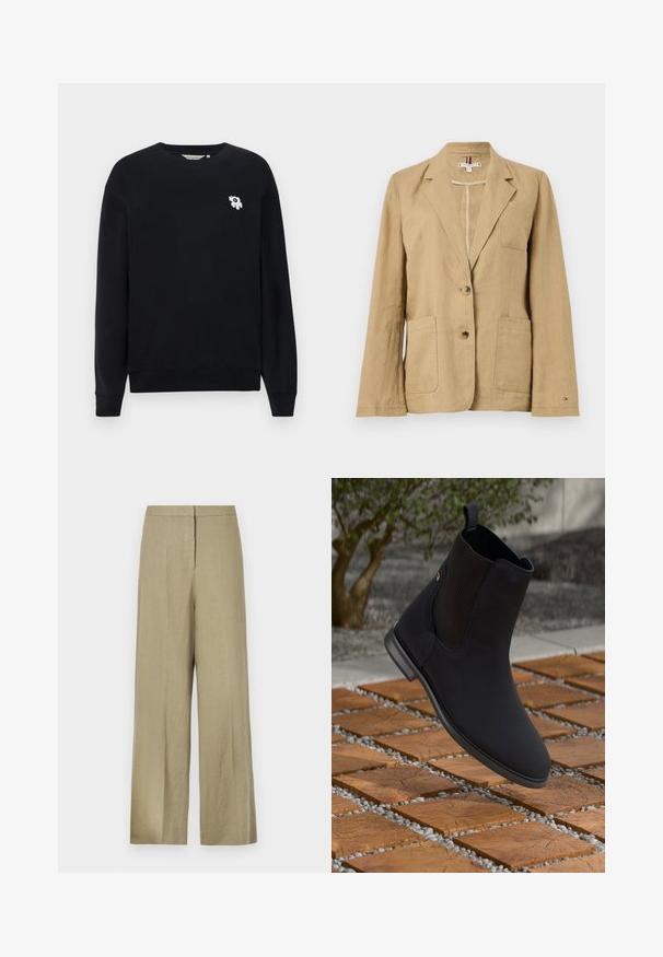 Blazer de linho bege com lapela de corte, dois bolsos frontais e fecho de dois botões. Apresenta um único bolso no peito e detalhes de costura visíveis.; Sweatshirt preto feito de algodão. Apresenta mangas longas, um decote redondo e um pequeno bordado floral branco no lado esquerdo do peito.; Calças largas de linho verde-claro. Apresenta uma cintura alta e um design frontal limpo com uma única pregadura.; Botim preto até ao tornozelo com painel lateral elástico a flutuar acima de ladrilhos quadrados de madeira com pedras num ambiente exterior.