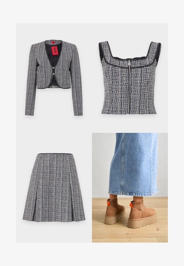Veste cropped en tissu tissé bleu marine et blanc. Elle présente un col rond, une fermeture à crochets à l'avant et des manches longues. Comprend une étiquette.; Top court en tweed bleu marine et blanc avec un encolure carrée, sans manches et une fermeture éclair à l'avant avec un tirette de marque.; Jupe en tweed marine avec un motif texturé, silhouette évasée et plis. La taille est noire, mettant en valeur le design de la jupe.; Bottes en suède brun à plateforme avec des panneaux latéraux élastiques et des languettes orange, associées à une jupe en denim clair arrivant au genou sur un sol en bois.