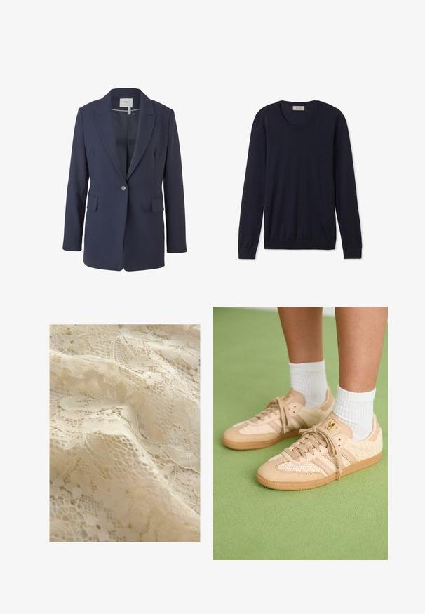 Granatowa marynarka z gładkiego materiału, z klapami w kształcie litery V, pojedynczym zapięciem na guzik i dwoma przednimi kieszeniami. Dopasowany krój z długimi rękawami.; Granatowy sweter z długim rękawem i okrągłym dekoltem, wykonany z miękkiego materiału, z prążkowanymi mankietami i dołem, charakteryzujący się klasycznym krojem i minimalnymi zdobieniami.; Beżowa tkanina koronkowa z kwiatowymi wzorami, misternymi detalami, różnorodnymi fakturami i delikatnym, półprzezroczystym wyglądem.; Stopy w beżowych, plecionych sneakersach Adidas z gumową podeszwą i białymi skarpetkami na zielonej teksturowanej podłodze.