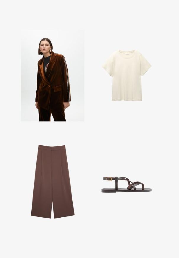 Brązowy aksamitny żakiet w podwójny guziki, z bocznymi kieszeniami i białymi oraz czarnymi paskami na rękawach.; Jasno beżowa, krótko rękawowa koszulka z okrągłym dekoltem, wykonana z miękkiego, gładkiego materiału. Posiada luźny krój i prosty dół.; Brązowe spodnie o szerokich nogawkach z gładką fakturą, z wysokim stanem i plisami z przodu. Materiał jest lekki i luźno opada.; Brązowe skórzane sandały z krzyżującymi się paskami, zapięciem na klamrę przy kostce oraz płaską podeszwą z minimalnymi detalami szycia.