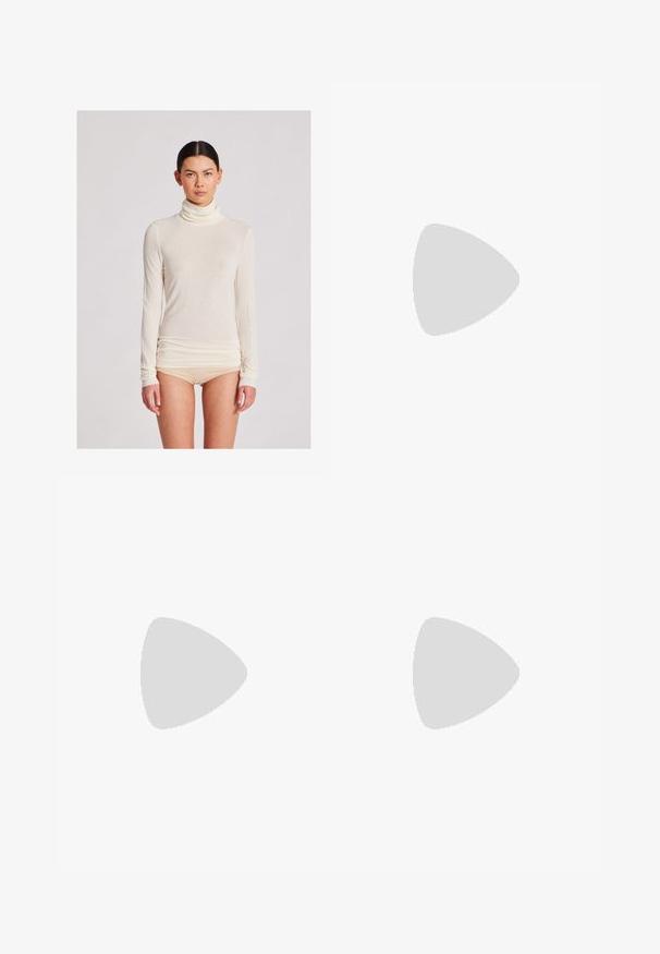 Long-sleeve turtleneck top in cream, made of lightweight fabric with a smooth texture; features fitted silhouette and gathered hem detailing.; Brown wide-leg trousers in cotton blend, featuring a frayed hem, front button closure, and classic five-pocket design. Minimalistic and versatile.; Brown leather slingback heel with a pointed toe, cutout detail at the vamp, and a sleek stiletto heel. Smooth texture.; Beige leather shoulder bag with a crescent shape, smooth texture, and a single curved handle. Features a zip closure and neat stitching.