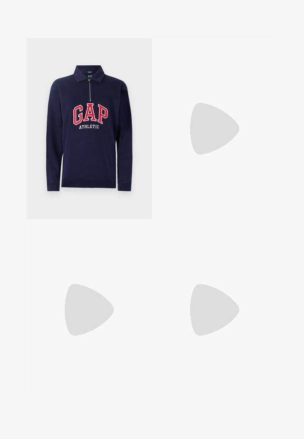 Polo majica dugih rukava tamnoplave boje s polu-zip zatvorenjem, s istaknutim crveno-bijelim logotipom "GAP ATHLETIC" sprijeda. Mekana tekstura tkanine.; Svijetlosmeđi uski traperice ravnog kroja, s pet džepova, kopčanjem na gumb i patentni zatvarač te ojačanim šavovima.; Svijetloplavi antilop loafer s glatkom teksturom, ukrasnim šavovima i smešnim gumiranim đonom. Sadrži dizajn za novčiće na gornjem delu.; Okrugle sunčane naočale s transparentnim okvirom, svjetlozelenim staklima i tankim, prozirnim krakovima. Imaju suptilne metalne akcenti na okviru.