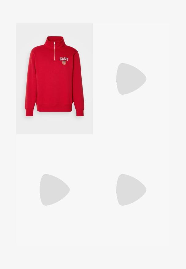 Punane sviiter kõrge krae ja pooltõmbega. Rinnal on brodeeritud logo. Pehme kangas tasase tekstuuriga.; Laiene püksid, mis on valmistatud tumedast hallist kangast. Omavad vööümbrikus voldikuid, on kohandatud disainiga ja sirge siluett.; Spordijalatsid valge nahkpealsega, halli nubuk-naha otsaga ja kolme musta triibuga. Omab sinist logo keele peal ja struktureeritud kummitalda.; Pärligael koos hõbedatooni kinnitusega. Koos ümmarguste valgete pärlite ja dekoratiivse, vääriskividega kaunistatud keskiga.