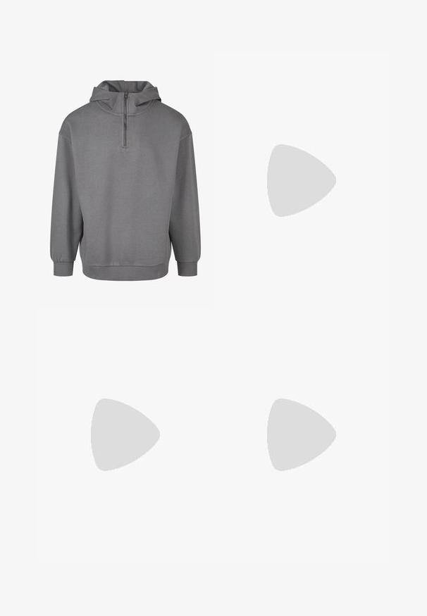 Felpa grigia con cappuccio e zip frontale a metà, maniche lunghe, polsini a costine e un morbido tessuto testurizzato. Design semplice senza motivi.; Pantaloni da jogging grigi realizzati in tessuto morbido, dotati di elastico in vita, tasche laterali e un design a gamba affusolata.; Scarpe sportive con tomaia in pelle bianca, punta in suede grigia e tre strisce nere. Presentano un logo blu sulla linguetta e una suola in gomma testurizzata.; Arnette THEKIDD UNISEX - Occhiali da sole - black