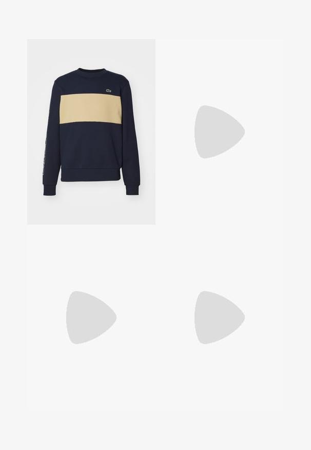 Jūras zilas krēklas ar gaiši brūnu horizontālu svītru. Tam ir apaļa izgriezne, ribotās aproces un neliels logotips uz krūtīm. Mīksta auduma tekstūra.; Balts kokvilnas T-krekls ar īsām piedurknēm, uz kā uzrakstīts "Jeu Set et Match" un uz kreisā krūts ir neliels zaļš logs. Klasiska izgriezuma.; Baltas sporta bikses ar tumši zaļām sānu joslām. Viegls materiāls, elastīga josta un aproces apakšā. Satur acu auduma tekstūru sānu joslās.; Zili auduma sporta apavi ar baltām stīgām un gumijas zolēm, izlikti kopā ar džinsiem un pelēkām ribotām zeķēm, uz gaiši pelēka pamata.