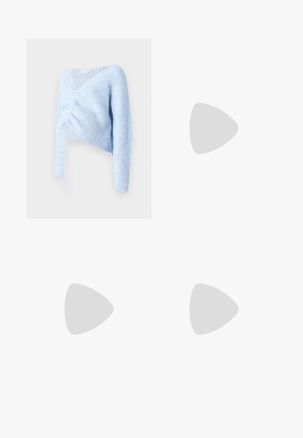 Light blue cropped sweater with a v-neck, long sleeves, ribbed texture, and gathered front detail with adjustable ties.; Black maternity leggings featuring a textured diamond pattern, wide waistband for support, and a flared bottom design.; White sneaker made of smooth synthetic material, featuring a rounded toe, lace-up design, flat sole, and subtle perforated detailing.; Brown leather tote bag with double handles, features contrast stitching and a spacious design, suitable for everyday use.