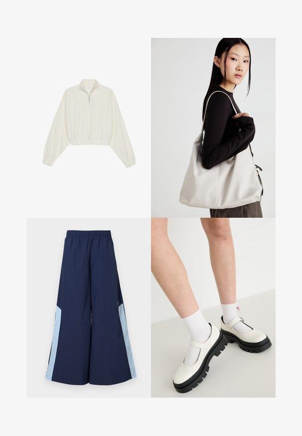 Pullover court en tissu crème, avec un col haut, fermeture éclair à mi-hauteur, ourlet et poignets élastiqués, offrant une texture lisse et un design minimaliste.; Pantalons larges navy avec une taille élastique, dotés de panneaux latéraux bleu clair et d'une texture lisse. Conçus pour le confort et la liberté de mouvement.; Des chaussures Mary Jane en cuir verni blanc avec une semelle noire épaisse, comportant une sangle sur le cou-de-pied et portées avec des chaussettes blanches.; Sac à main beige en matériau souple, avec un design décontracté, des détails cousus et deux poignées. Idéal pour un usage quotidien.