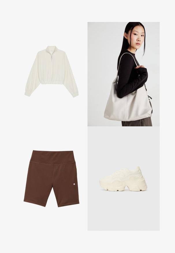 Cropped pullover in cream fabric, featuring a high collar, half-zip closure, elasticated hem and cuffs, with a smooth texture and minimal design.; Brown athletic shorts with a high waistband, flat seams, and a small white logo on the lower left. Made from stretchy, moisture-wicking material.; Chunky white sneakers made of textured mesh and synthetic materials, featuring a thick sole and intricate pattern details along the sides.; Beige handbag made of soft material, featuring a slouchy design, stitched detailing, and two shoulder straps. Suitable for everyday use.