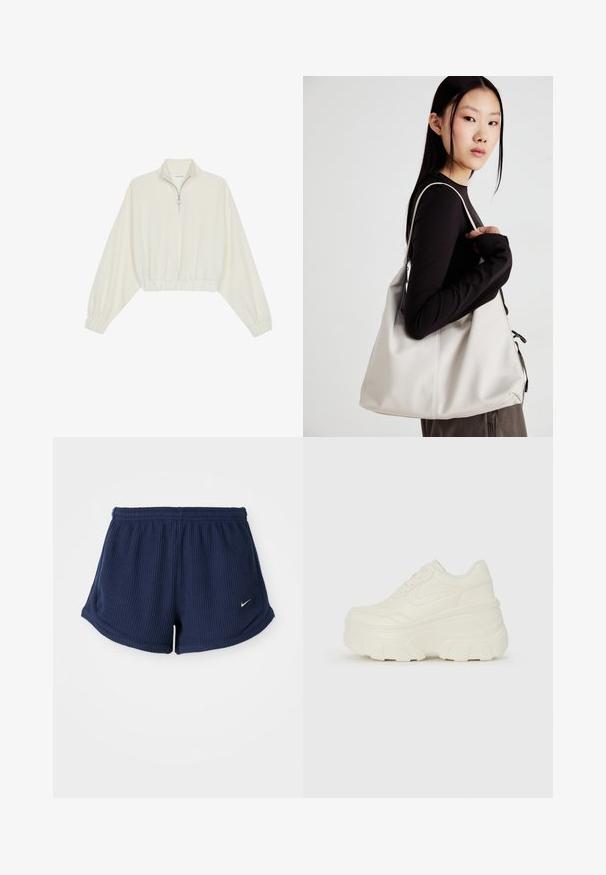 Avkortad tröja i krämfärgad tyg, med hög krage, halvdragkedja, elastisk nederkant och ärmar, med en slät yta och minimalistisk design.; Marinblå ribbade träningsshorts med elastisk midja, med en liten vit Nike-logotyp på nederkanten. Mjuktexturerat tyg.; Vita plattformssneakers med en slät läderliknande överdel, rundad form, vadderad krage och texturerad gummisula med definierade mönster.; Beige handväska tillverkad av mjukt material, med en avslappnad design, sydda detaljer och två axelremmar. Lämplig för dagligt bruk.