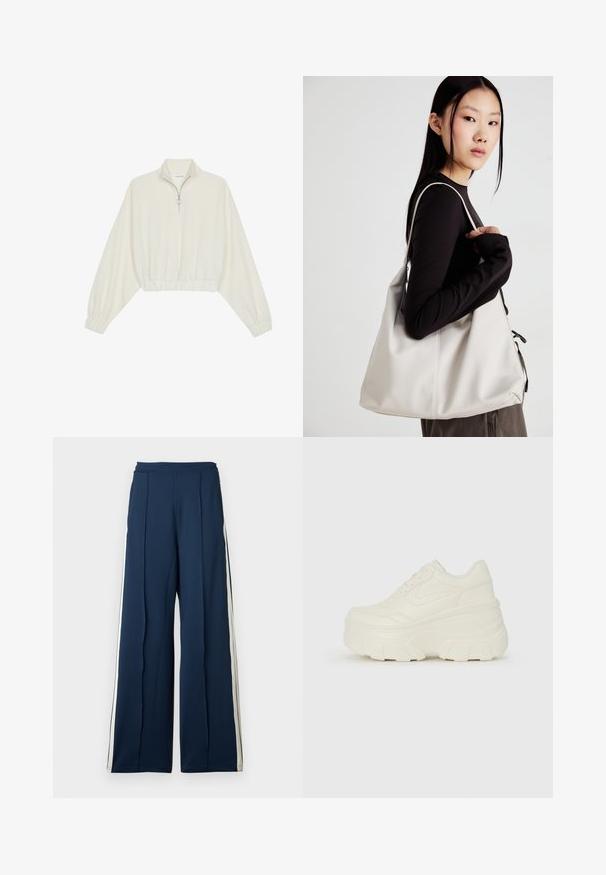 Pullover curto em tecido creme, apresentando um colarinho alto, fecho de meio zíper, bainha e punhos elásticos, com uma textura suave e design minimalista.; Calças largas em tecido azul-marinho escuro com riscas laterais em creme. Apresentam uma cintura alta e detalhes plissados para uma estrutura adicional.; Tênis brancos de plataforma com um cabedal suave semelhante a couro, formato arredondado, colarinho acolchoado e sola de borracha texturizada com ranhuras bem definidas.; Uma bolsa bege feita de material macio, com um design descontraído, detalhes de costura e duas alças para o ombro. Adequada para uso diário.