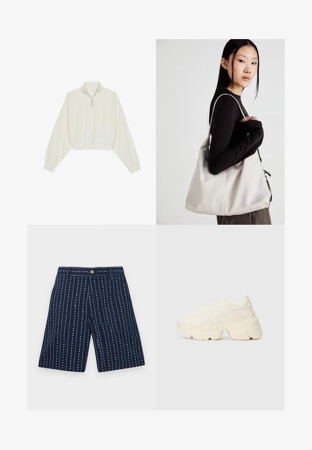 Cropped pullover in cream fabric, featuring a high collar, half-zip closure, elasticated hem and cuffs, with a smooth texture and minimal design.; Navy shorts featuring vertical stripes with small heart patterns, made of fabric with a soft texture. Equipped with a front button and zipper.; Chunky white sneakers made of textured mesh and synthetic materials, featuring a thick sole and intricate pattern details along the sides.; Beige handbag made of soft material, featuring a slouchy design, stitched detailing, and two shoulder straps. Suitable for everyday use.