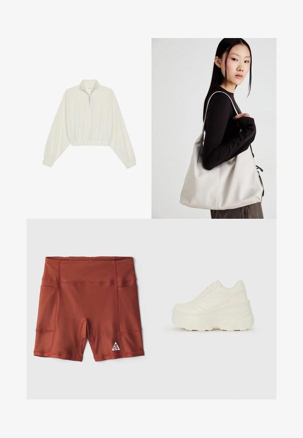Pullover curto em tecido creme, apresentando um colarinho alto, fecho de meio zíper, bainha e punhos elásticos, com uma textura suave e design minimalista.; Calças curtas atléticas vermelhas feitas de um tecido elástico, com bolsos laterais e um logótipo triangular na parte inferior da perna direita. Textura suave e design elegante.; Tênis brancos de plataforma com um cabedal suave semelhante a couro, formato arredondado, colarinho acolchoado e sola de borracha texturizada com ranhuras bem definidas.; Uma bolsa bege feita de material macio, com um design descontraído, detalhes de costura e duas alças para o ombro. Adequada para uso diário.