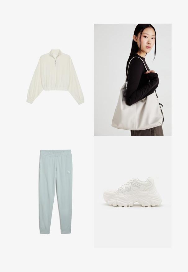 Kort striktrøje i cremefarvet stof med høj krave, halvlynlås, elastisk kant og manchetter, glat tekstur og minimalistisk design.; Lyseblå sweatpants med elastisk talje, sidelommer og et lille logo- mærke på venstre lår. Glat stof og tætsiddende pasform.; Hvide chunky sneakers med en tekstureret overdel, mesh-paneler og tykke gummisåler med et markant dækmønster. Snørebånd og en pull-tab medfølger.; Beige håndtaske lavet af blødt materiale med et slouchy design, stikninger og to skulderremme. Velegnet til daglig brug.