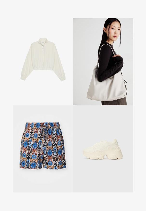 Geknipt pullover in crèmekleurige stof, met een hoge kraag, halve rits, elastische zoom en manchetten, met een soepele textuur en minimalistisch ontwerp.; Patronen shorts met een elastische tailleband. Heeft levendige blauwe, rode en bruine ontwerpen op een lichte stofachtergrond.; Chunky witte sneakers gemaakt van geperforeerd mesh en synthetische materialen, met een dikke zool en ingewikkelde patroon details aan de zijkanten.; Beige handtas gemaakt van zacht materiaal, met een slonzig ontwerp, gestikte details en twee schouderbanden. Geschikt voor dagelijks gebruik.
