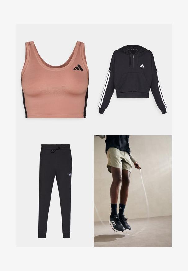 Czarna krótka bluza z kapturem, wykonana z miękkiego materiału, z przednią kieszenią, zapięciem na zamek oraz białymi paskami na rękawach i logo na piersi.; Biustonosz sportowy w miękkim, różowym kolorze z okrągłym dekoltem, czarnymi paskami po bokach i subtelnymi akcentami logo. Dopasowany krój z gładką teksturą.; Czarne spodnie sportowe wykonane z miękkiego materiału, z elastycznym paskiem w talii, zwężanymi nogawkami oraz małym białym logo Adidas na lewym udzie.; Czarne sportowe buty z białymi paskami, oliwkowe szorty i granatowe skarpetki. Osoba trzyma skakankę w rękach. Neutralne tło.