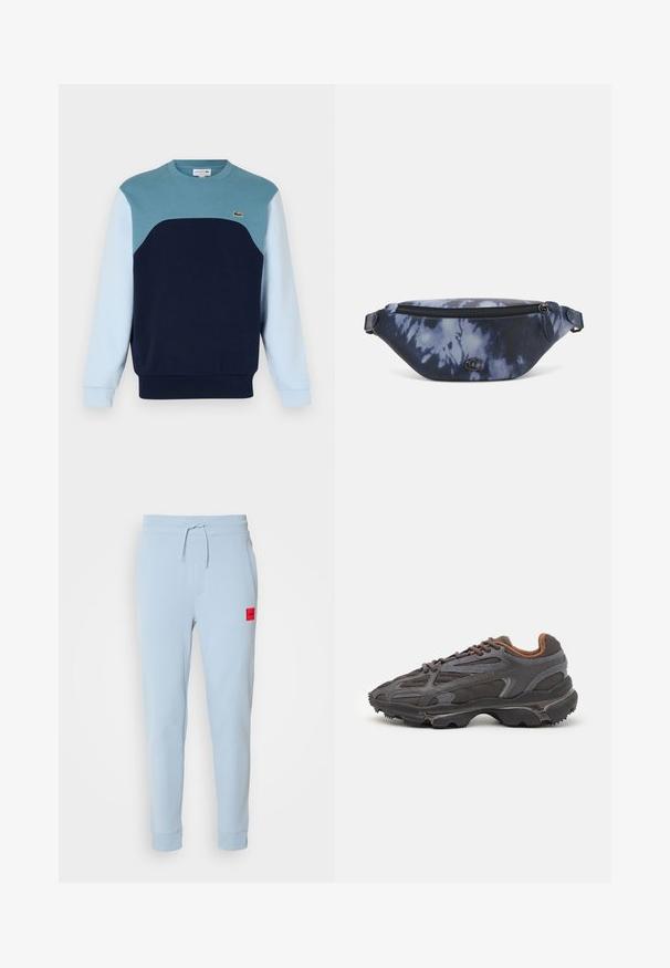 Blauwe sweatshirt gemaakt van katoen. Heeft een kleurblokontwerp met teal, marineblauw en lichtblauwe panelen. Bevat een klein logo op de borst.; Lichtblauwe katoenen joggers met een verstelbare taille, zijzakken en een klein rood logo op de linkerkant. Slimme boorden bij de enkels.; Lacoste sneakers in donkergrijs van mesh en synthetisch materiaal, met een gestructureerde zool en bruine accenten op de kraag en branding.; Fanny pack in donkerblauw tie-dye print met een ritssluiting bovenaan, textuur materiaal en een opvallend logo op de voorkant.