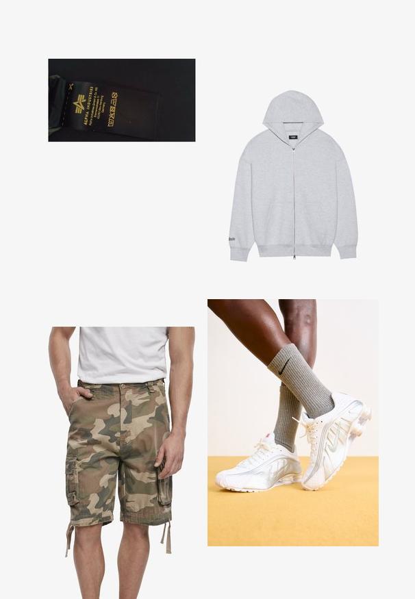 Grau zip-up Hoodie aus weichem Stoff. Mit einer großen Kapuze, Fronttaschen und bedrucktem Text am linken Ärmel.; Schwarzes Pflegeetikett aus Stoff mit gelbem Text, auf dem der Markenname "Alpha Industries", Pflegehinweise und Herstellungsdetails angezeigt werden.; Camo Cargo-Shorts in gedämpften Grünen und Brauntönen mit Seitentaschen und verstellbaren Kordeln am Saum, kombiniert mit weißen Sneakers.; Nike-Sneaker in Weiß mit silbernen Akzenten, ausgestattet mit strukturierten Paneelen und Perforationen. Kombiniert mit grauen gerippten Socken, vor einem gelben Hintergrund.