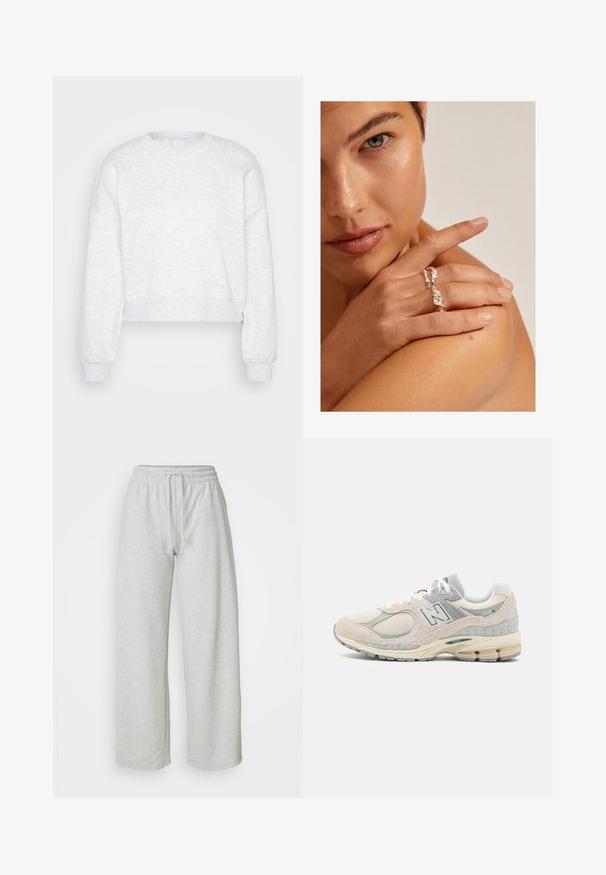 Gai pelēks, garām piedurknēm, saīsināts sporta krekls ar ribota veida aprocēm un augstu apkakli, izlikts uz vienkārša gaiša fona.; Even&Odd Petite Treniņtērpa apakšdaļas - mottled light grey; Gai pelēki un smilšu krāsas New Balance sporta apavi ar zamšādas un acu materiālu, mīkstu apkakli, biezu zoli un atstarotājiem akcentiem. Auklu dizains.; Sudraba spunģots gredzens ar teksturētu dizainu, ko nēsā uz rokas, kas balstīta uz pleca. Ādas tonis ir silts, ar īsiem nagiem.