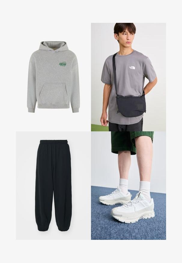 Felpa grigia in cotone con tasca a canguro frontale, polsini e orlo a costine, e un logo verde "ANOTHER COTTON LAB" sul lato sinistro del petto.; Pantaloni da jogging neri con vita elasticizzata, dalla vestibilità morbida, caviglie a costina, texture liscia e senza motivi visibili o dettagli in metallo.; Scarpe da ginnastica bianche con sovrapposizioni testurizzate, suola spessa e accenti grigi. Indossate con calze corte bianche e pantaloni corti verdi su una superficie blu.; Borsa a tracolla nera in nylon con tracolla regolabile, dotata di chiusura a cordoncino e dettaglio logo in rilievo. Indossata sopra una maglietta grigia.