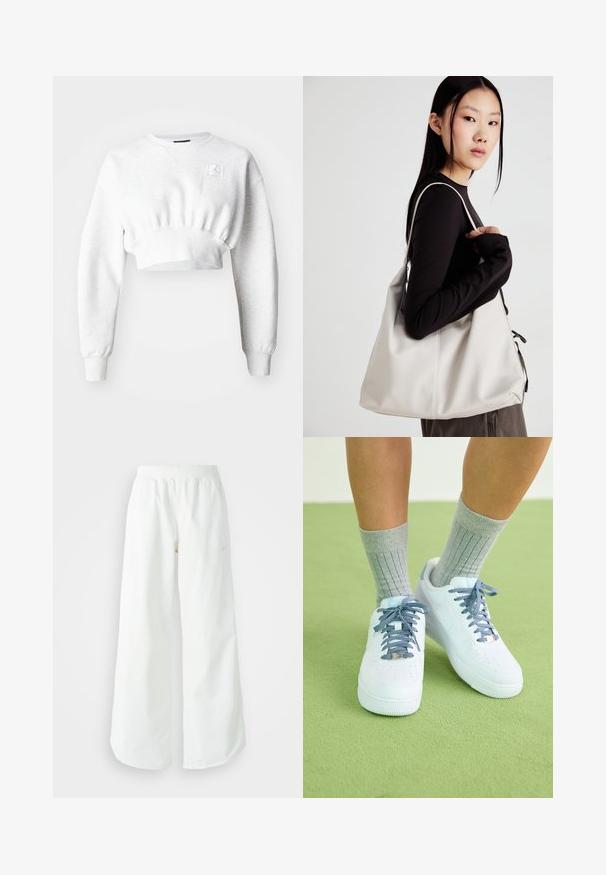 Felsőrésszel levágott, világosszürke anyagú pulóver, hosszú ujjal, bordás szegéllyel és egy kis logóval a mellrészen. Sima textúrájú, laza fazon.; Fehér, bő szárú sportnadrág ribbelt derékpánttal és diszkrét logórésszel. Simá szövet, laza szabással és taperált szárral.; Fehér bőr sportcipő kék akcentusokkal, perforált orrdesignnal és texturált kék-fehér cipőfűzőkkel, szürke bordás zoknikkal viselve.; Puha anyagból készült bézs kézitáska, laza dizájnnal, varrott részletekkel és két vállpánttal. Mindennapi használatra alkalmas.