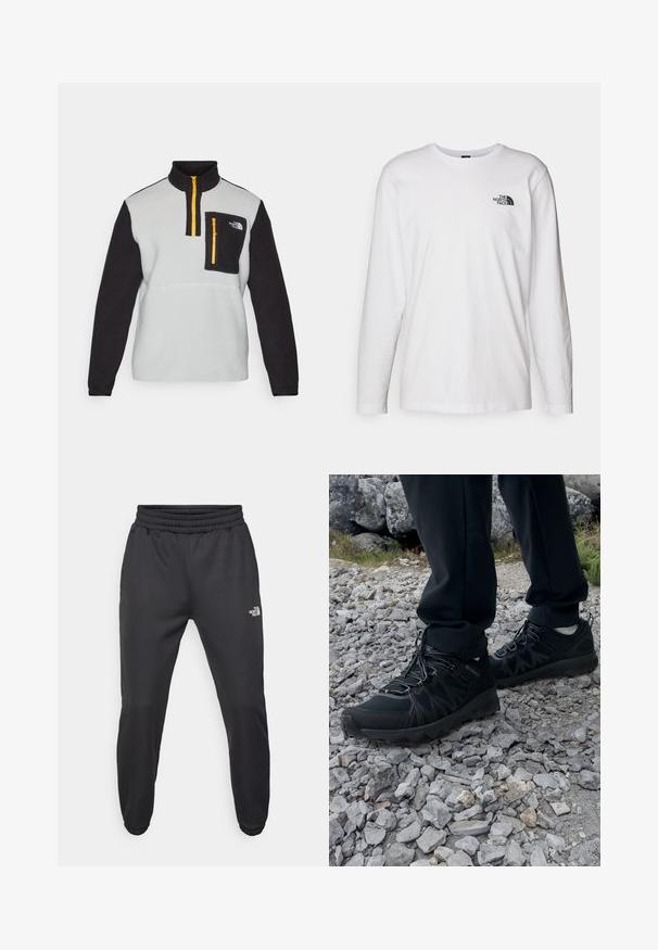 Polarowy pulower w odcieniach szaro-czarnych z wysokim kołnierzem, pół-zamkiem z przodu, kieszenią na zamek na piersi i kontrastującym żółtym detalem zamka.; Biała koszulka z długim rękawem wykonana z bawełny, z okrągłym dekoltem. Posiada małe czarne logo na piersi. Gładka faktura, regularny krój.; Czarne dresy z elastycznym paskiem w talii, zwężanym krojem, elastycznymi mankietami i małym białym logo na lewej udzie, wykonane z gładkiego materiału.; Czarne buty outdoorowe wykonane z siateczki i materiału syntetycznego, z fakturowaną cholewką, zabezpieczonym systemem sznurowania i solidną podeszwą, na skalistym terenie.