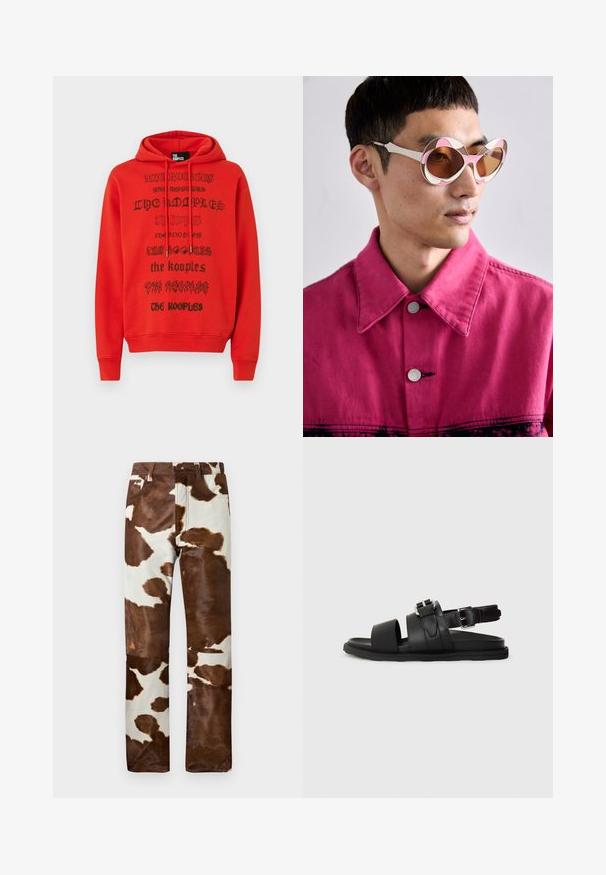 Red hoodie featuring black printed text with varying fonts. Material appears soft, with a kangaroo pocket and adjustable drawstring hood.; Cow-print pants in a blend of brown and beige. Features a relaxed fit, sturdy denim material, and classic five-pocket design.; Black leather sandal featuring two wide straps and an adjustable ankle strap with a buckle. Flat sole with a textured edge.; White and pink oversized sunglasses with a curved frame, featuring brown tinted lenses. Model wears a pink denim jacket with a collar.