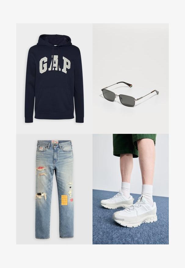 Marineblaue Baumwollkapuzenjacke mit einem großen, hellgrauen "GAP"-Logo, einer vorderen Tasche und Kordeln an der Kapuze. Klassisches Design mit gerippten Bündchen.; Hellblaue Jeans aus Denim mit lockerer Passform, die ausgefranste Patches in verschiedenen Farben und Mustern aufweisen, darunter orange und rote Akzente.; Weiße Sportschuhe mit strukturierten Überzügen, einer dicken Sohle und grauen Akzenten. Tragen mit weißen Crew-Socken und grünen Shorts auf einer blauen Oberfläche.; Polaroid UNISEX - Sonnenbrille - matte black