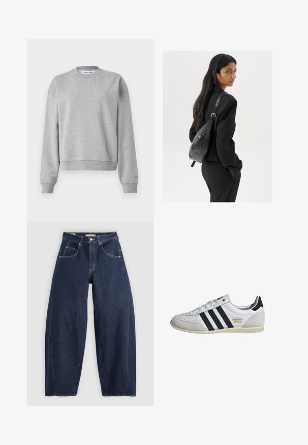 Felpa grigia con scollo rotondo, maniche lunghe e un design leggermente corto. Realizzata in tessuto morbido con polsini e orlo a costine.; Jeans in denim blu scuro con una vestibilità ampia, cuciture chiare, cinque tasche e chiusura con bottone in vita.; Sneaker bianco con strisce nere e brandizzazione dorata. Presenta materiali in suede e pelle, una tomaia perforata e una suola in gomma testurizzata.; Donna con lunghi capelli scuri, vestita con un completo nero, che porta una borsa a tracolla in pelle nera, mentre guarda oltre la spalla su uno sfondo bianco.