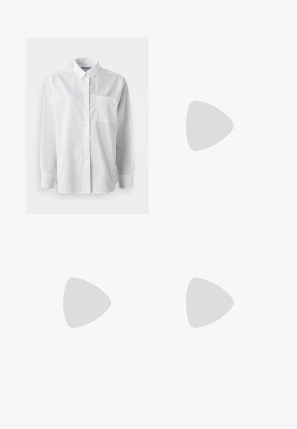 Camisa branca de button-up, material de algodão, mangas longas, colarinho clássico, bolso no peito, barra reta, textura mínima, sem padrões.; Calças de ganga largas em azul escuro com um cós elástico ajustável, bolsos frontais e detalhes de costura em laranja contrastante.; Sapatilhas Nike verde menta claro com parte superior em malha e sola texturizada, combinadas com leggings verde-oliva e meias brancas.; Óculos de sol de tartaruga com lentes ovais alongadas, tom castanho, acentos de logotipo dourado nas hastes e hastes pretas elegantes.