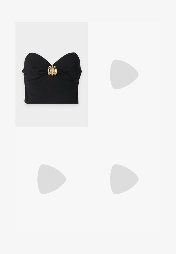 Black strapless top made of smooth fabric, featuring a twisted front design and a gold hardware accent at the center.; White tailored trousers with adjustable suspenders, pleated front, side pockets, and a smooth texture. Minimalist design, no patterns.; Black high-heeled sandals feature thin straps with a knotted design, a smooth square toe, and a sleek stiletto heel.; Silver hoop earrings with a smooth, shiny finish. Rounded shape, lightweight design, featuring a post-back closure.