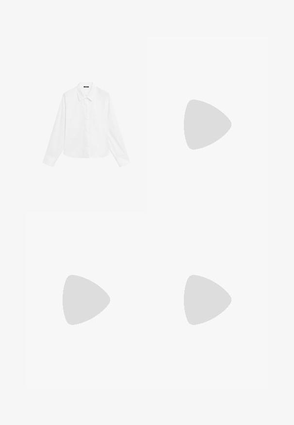 Vit långärmad skjorta med spetsig krage, knäppning fram och rak fåll. Tillverkad av en mjuk tyg som ger ett fräsch och ren look.; Ljusa blå högmidjade raka jeans med framfickor, bälteshällor och knäppning på en vit bakgrund.; Svarta läderloafers med en kraftig strukturerad sula, med ett band över fotdelen och en slät, polerad yta.; Svarta överdimensionerade solglasögon med ovala linser, slät plastbåge och guldaccent på bågarna. Mörka linser ger solskydd.; Silver ring med en slät, böjd design och en stjärndetalj. Modell som bär en grön sweatshirt med gul text, händerna nära halsen.