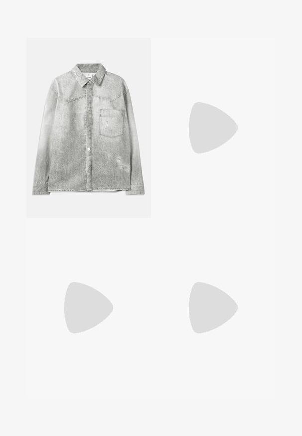 Gray denim shirt with a button-up front, pointed collar, chest pocket, and distressed details. Features a textured finish and standard fit.; White short-sleeve t-shirt made of textured cotton. Features a crew neckline and straight-cut hem. Minimalist design with no visible logos.; Beige sweatpants with an elastic waistband, cuffed hems, and a smooth texture. Simple, straight-leg design without patterns or embellishments.; White athletic shoes with mesh upper, textured accents, and cushioned sole. Paired with black ribbed ankle socks on a blue carpeted surface.