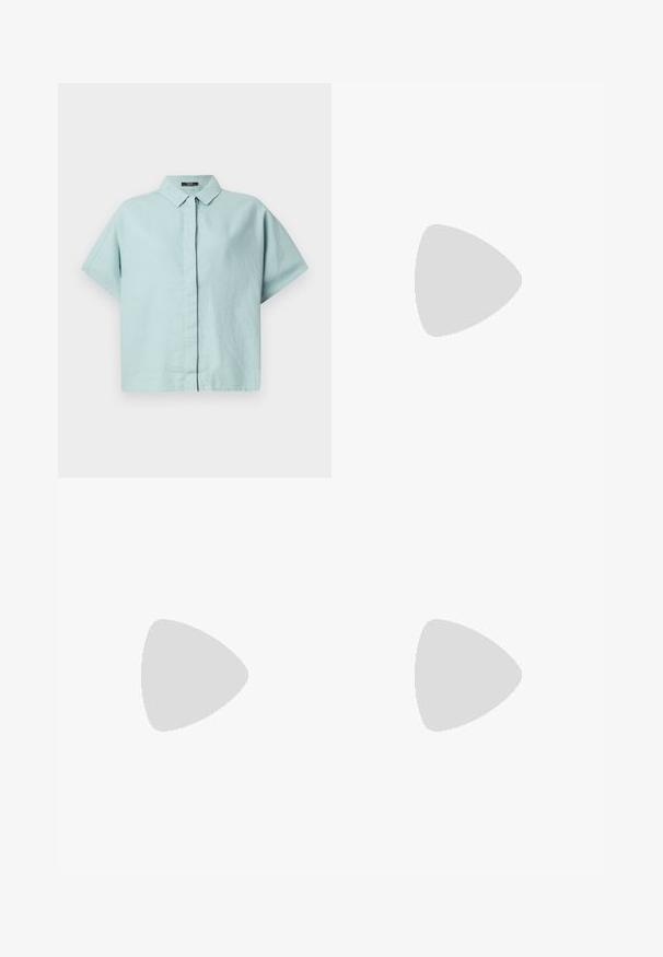 Light blue short-sleeve collared shirt made from textured fabric; features a button-down front and relaxed fit. Simple design with no patterns.; Black pleated trousers with an elastic waistband. Features wide legs and a smooth, textured fabric with vertical stripes.; Black patent leather slingback heels with a pointed toe and a geometric block heel. Features a sleek, minimal design and smooth texture.; Black leather handbag with a curved shape, detachable strap, and gold hardware. The bag features a flap with a buckle detail.