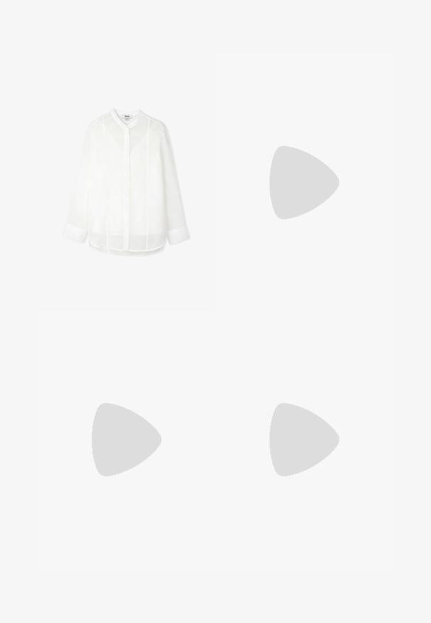 Camicia bianca in lino con colletto alla cinese, chiusura frontale con bottoni e maniche lunghe. Presenta sottili dettagli di cucitura verticale.; Pantaloni a gamba larga di un leggero colore crema. Realizzati in un tessuto morbido con pieghe sul davanti e tasche laterali.; Sandalo bianco con tacco alto, caratterizzato da un design a cinturini e un legaccio alla caviglia. Texture liscia con una piattaforma frontale per un'altezza aggiuntiva.; Borsa a tracolla in pelle marrone con forma curvata, hardware dorato e un dettaglio con fibbia. Presenta una tracolla rimovibile.