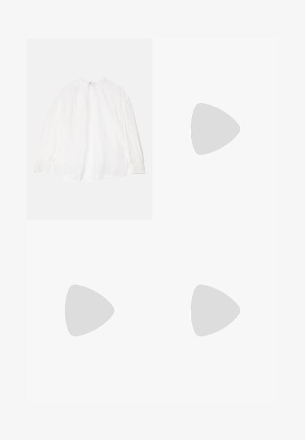 White blouse with long, gathered sleeves, a tied neckline, and a relaxed fit. Features slightly textured fabric and elastic cuffs.; Black wide-leg trousers made of a smooth fabric with a high waistband, featuring two front pleats and a tailored design.; Black leather sandal with a square toe, thin straps, adjustable ankle strap, and a low heel. Features a small gold accent on the strap.; Black leather handbag with a rounded shape, featuring a large gold decorative knot on the front and an adjustable strap.