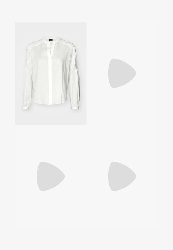 White button-up shirt made of light fabric, featuring a collar, long sleeves, and a relaxed fit. Subtle stitching detail along shoulder seams.; Black tailored trousers with a straight-leg design, featuring a smooth texture and crisp creases along the front. No visible hardware.; Beige block-heeled sandals with thin straps and a square toe. Smooth material with minimal detailing, designed for easy wear.; Black leather handbag with a structured design, featuring a cropped shape, top handle, and gold hardware accent. Adjustable shoulder strap included.