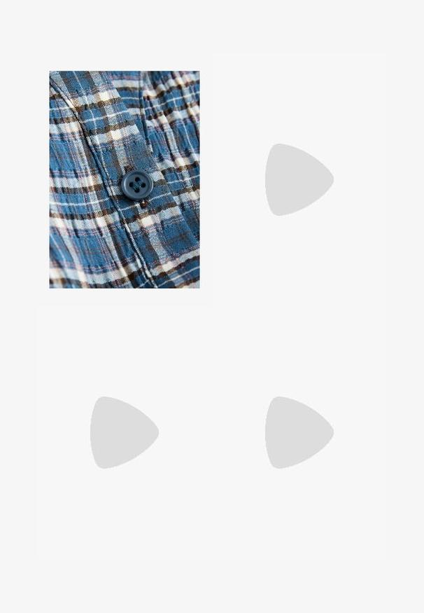 Blue and cream checked fabric with a button detail. Material is lightweight and textured, featuring dark brown accents in the pattern.; Dark blue wide-leg jeans made of denim. Features a belted waistband with multiple buttons, front pockets, and a clean finish at the hems.; Sport shoes with a white leather upper, gray suede toe, and three black stripes. Features a blue logo on the tongue and a textured rubber sole.; Woven leather handbag in tan, oval shape with a thick braided handle, featuring a zip closure and glossy texture.