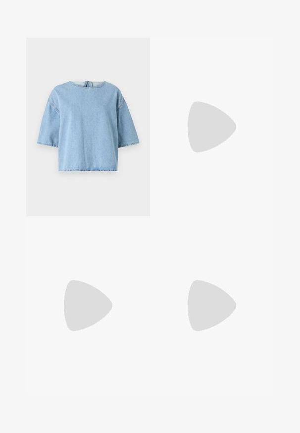 Top in denim azzurro chiaro, maniche corte, con scollatura rotonda e vestibilità ampia. Presenta cuciture in evidenza e un tessuto leggermente texturizzato.; Jeans beige a gamba larga in cotone. Caratterizzati da chiusura con bottone, passanti per cintura e tasche anteriori con una consistenza liscia e morbida.; Stivale alla caviglia bordeaux lucido con un tacco spesso nero, caratterizzato da una superficie liscia e un design semplice. Nessuna chiusura visibile o motivo.; Borsa tote in pelle marrone con texture liscia, design con apertura superiore e due spallacci. Presenta cuciture minime e nessun hardware visibile.