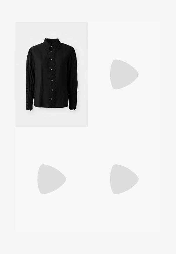 Blusa negra de manga larga con cuello scalloped y placket de botones con acentos de perlas. Fabricada en un tejido ligero con un detalle texturizado.; Vestido blanco sin mangas con un sutil patrón de corazones, cremallera negra y tres lazos de lentejuelas negras en el frente, además de dos bolsillos con lazos.; Bailarinas de cuero negro con puntera afilada, acentos de tachuelas plateadas a lo largo del lado y una correa con detalle de hebilla cuadrada.; Bolso de cuentas hecho de perlas blancas, con una superficie texturizada y un fondo con flecos, llevado con una prenda arrugada de color beige.; Pendientes de gota plateados con múltiples rhinestones transparentes, con un diseño en cascada y superficies texturizadas, sobre un fondo neutro.