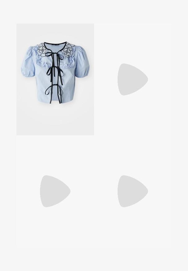 Light blue short-sleeve blouse with a ruffled collar, black floral embroidery, and black ribbon ties at the front. Smooth cotton texture.; Black flared jeans made of denim. Features a button closure, five pockets, and a smooth texture. The flared leg starts below the knee.; Black patent leather slingback heels with a pointed toe and a geometric block heel. Features a sleek, minimal design and smooth texture.; Black leather handbag with a curved shape, detachable strap, and gold hardware. The bag features a flap with a buckle detail.